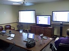 The Purple Wave auction situation room with on...